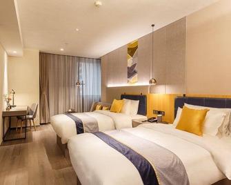 Home Inn Style Dalian Central Hospital Chunliu Metro Station Airport - Dalian - Bedroom