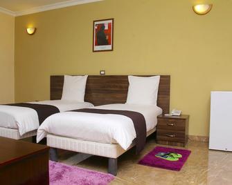 Melodie Hotel - Addis Ababa - Ložnice