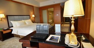 난하이 지아이 인터내셔널 호텔 - 포산 - 침실