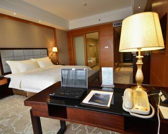 Foshan Jiayi Hotel (Nanhai Sports Center) - Foshan - Bedroom