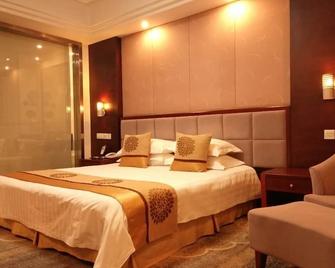 Jiuhuashan Center Hotel - Chizhou - Habitación