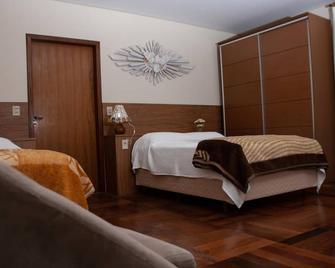Apart Hotel Água Limpa - Prados - Habitación
