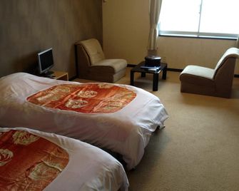 Biwako Rakuen Hotel Izutsu - Ōtsu - Schlafzimmer