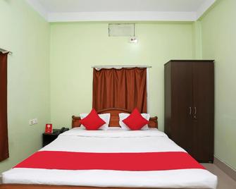 Goroomgo Somnath Rest House Puri - Near Sea Beach - Puri - Slaapkamer