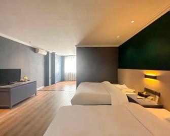 Psy Hotel (Fangchenggang Port) - Fangchenggang - Bedroom