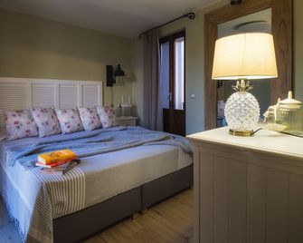 La Maison Du Lac Iseo - apt C - 프레도레 - 침실