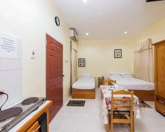 Travel Suites Ltd - Port of Spain - Bedroom