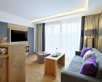 Sunnsait - Appartements für Genießer - Maria Alm am Steinernen Meer - Wohnzimmer