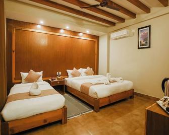 Paradise Boutique Hotel - Pokhara - Schlafzimmer