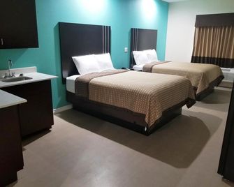Scottish Inns & Suites - Bay City - Habitación
