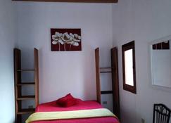 ديبارتامينتوس جراتسيلا - ألاموس - غرفة نوم