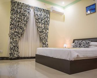 Charming Holiday Lodge - Addu City - Slaapkamer