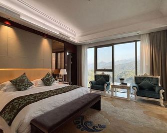 Huangshan Fengda International Hotel - Huangshan - Schlafzimmer