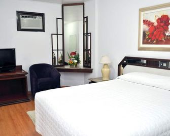 Caravelle Palace Hotel - קוריטיבה - חדר שינה