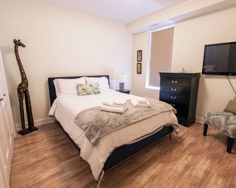 Spacious 3 Bedroom Apartment in Heart of Niagara - Thorold - Bedroom