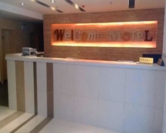 Motel 168 Jinan Shanda Road - Jinan - Front desk