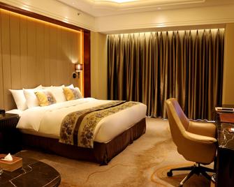 Wyndham Grand Plaza Royale Xianglin Shaoyang - Shaoyang - Bedroom