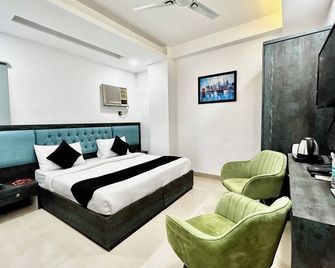 Hotel Cosmo - Karol Bagh - 新德里 - 臥室