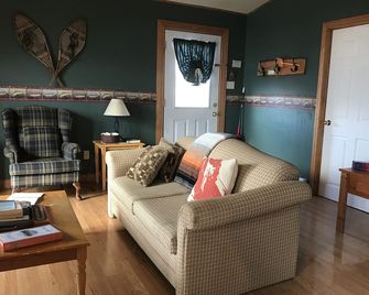 Whispering Waves Cottages - Roseway - Living room