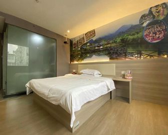 7 Lavender Hotel (Shangrao Daihu Road Branch) - Shangrao - Schlafzimmer