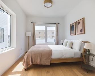 Cool Jersey City 1BR w/ elevator, A/C, by Blueground - Jersey City - Bedroom