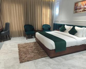 Kemberly Hotel - Zerakpur - Спальня