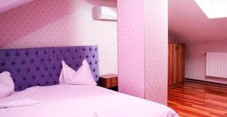 Hotel Papion - بوخارست - غرفة نوم