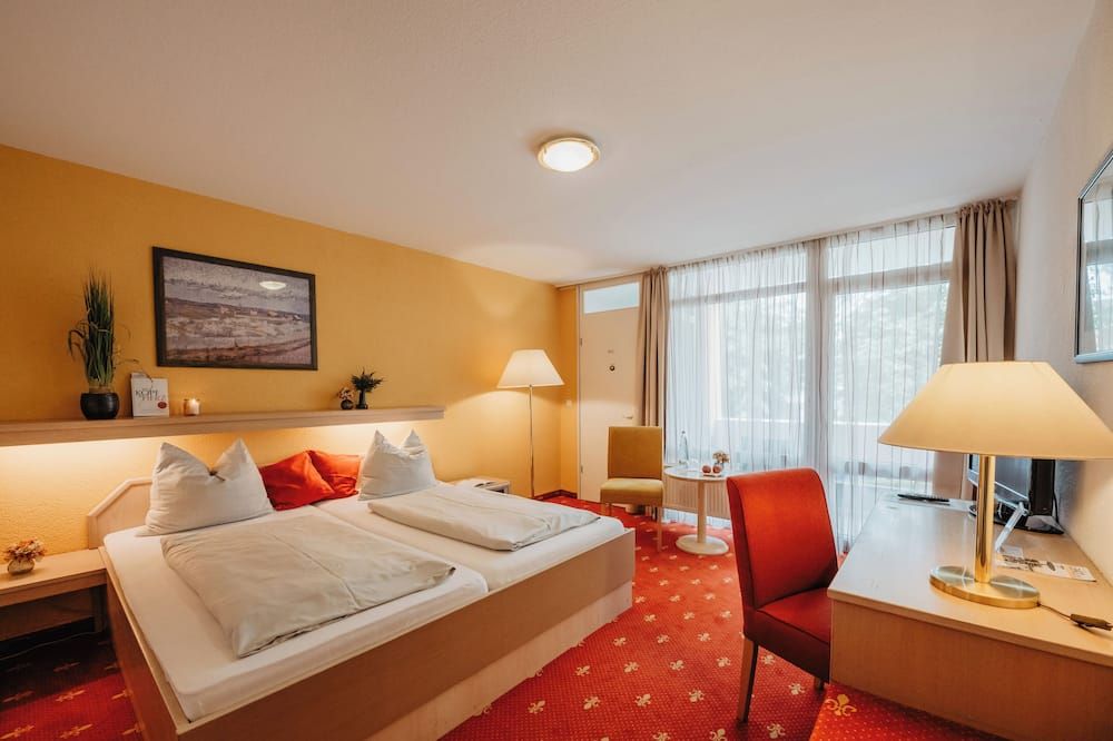 Kurhotel Panland - באד פוסינג - חדר שינה