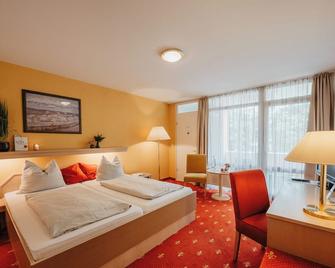 Kurhotel Panland - באד פוסינג - חדר שינה