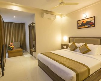 Grand Plaza Suites - Kozhikode - Habitación