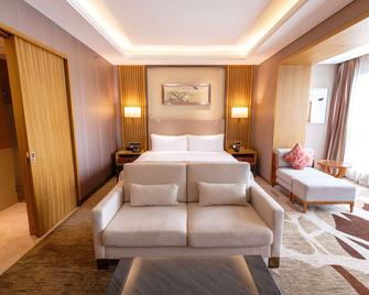 Ramada Plaza by Wyndham Fuzhou South - Fuzhou - Soveværelse