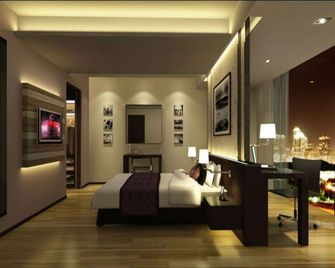 Davanam Sarovar Portico Suites Bengaluru - Bangalore - Makuuhuone