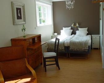 Sundsmåla Landsbygdshotell - Brokind - Schlafzimmer