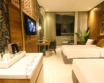 Pohon Inn Hotel - Маланг - Спальня