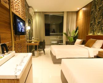 Pohon Inn Hotel - Маланг - Спальня