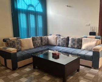 Heritage Inn - Islamabad - Obývací pokoj