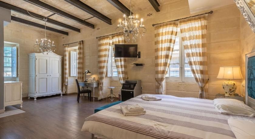 Bedroom view of Luciano Al Porto Boutique