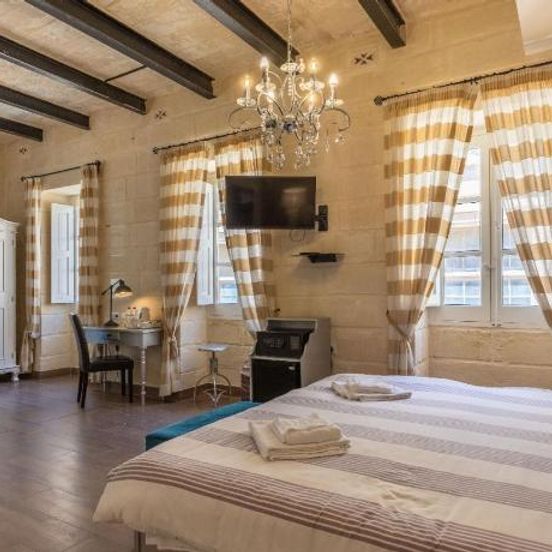 Bedroom view of Luciano Al Porto Boutique