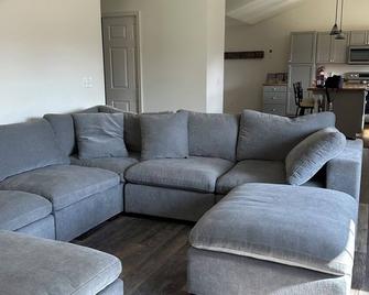 We are open - power, internet, water and access intact. - Little Switzerland - Living room