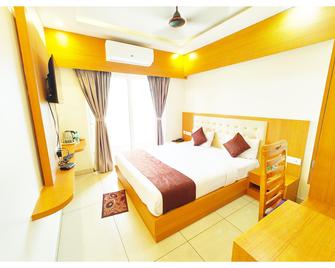 Goroomgo Shree Gajanana Puri - Near Sea Beach - Puri - Bedroom