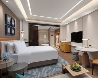 C&D Hotel Donghai Quanzhou - Čchüan-čou - Ložnice