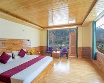 Hotel Sumeera Inn - Manali - Bedroom
