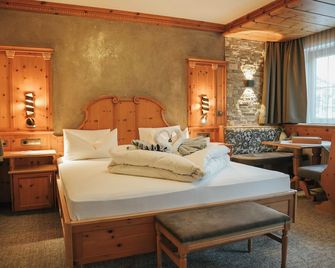 Hotel Alpenjuwel 4 Sterne Superior - Tux - Bedroom