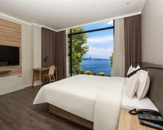Sea of Clouds Resort Hotel (Bohai Park) - Dali - Bedroom