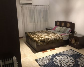 Three-Bedroom Apartment in Mohandseen - קהיר - חדר שינה
