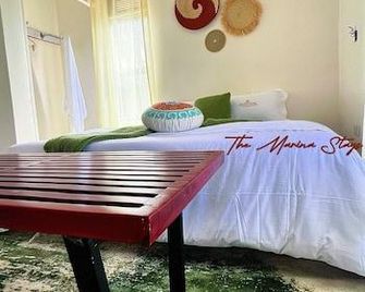 The Marina Stays Private Hotel Spa Entebbe - Ентеббе - Спальня