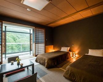 Takamiya Hotel Rurikura Resort - Yamagata - Bedroom