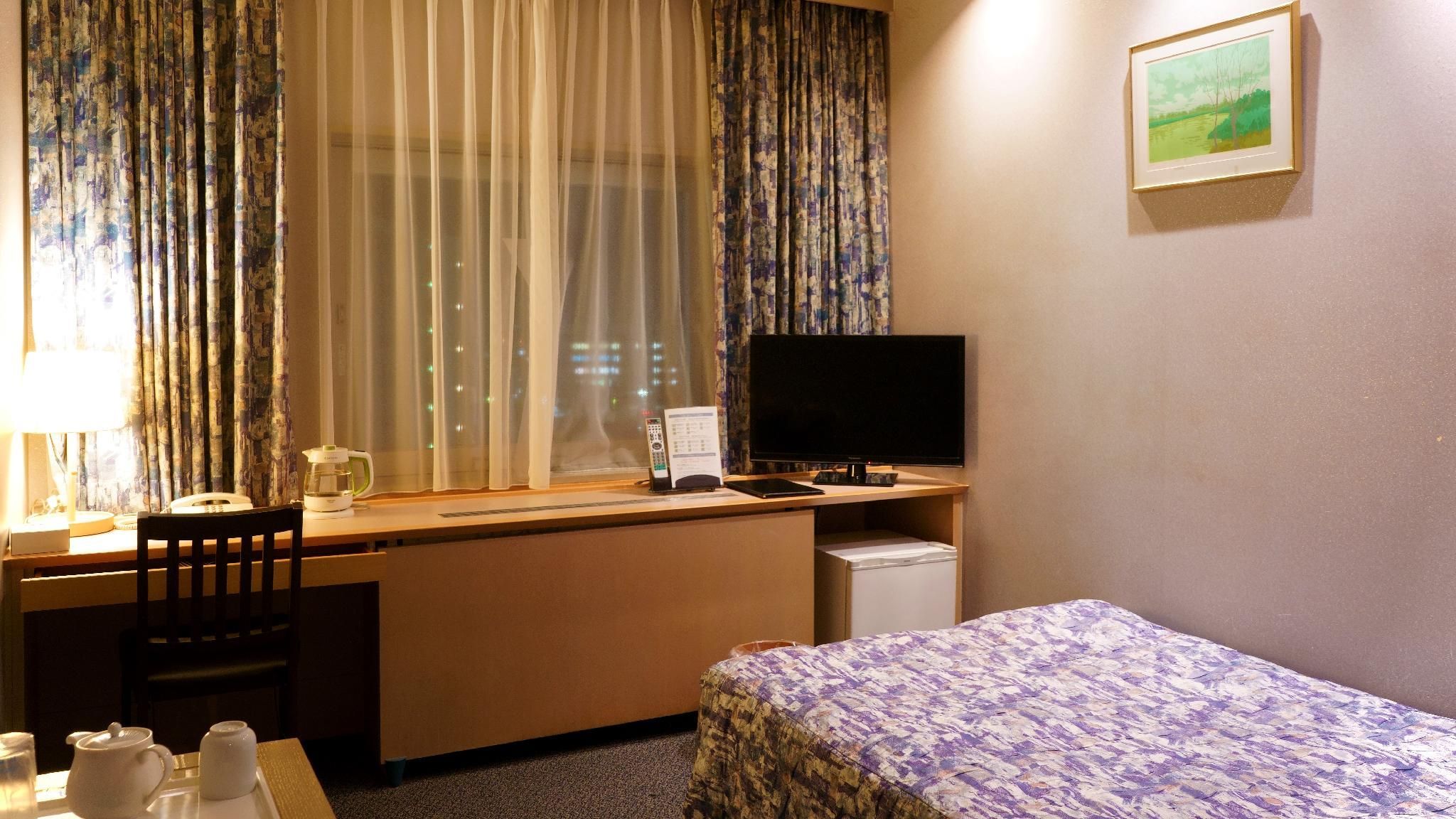 Omihachiman Station Hotel - Ōmihachiman - Schlafzimmer