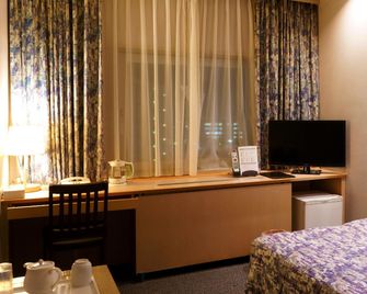 Omihachiman Station Hotel - Ōmihachiman - Schlafzimmer