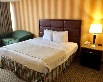 E Hotel Banquet & Conference Center - Edison - Bedroom